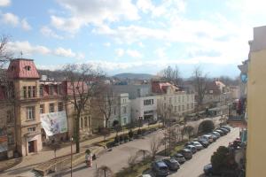 a view of a city with cars parked on a street at Apartament Bankowa in Jelenia Góra