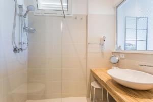 a bathroom with a sink and a shower at Hotel Nobel in Gabicce Mare