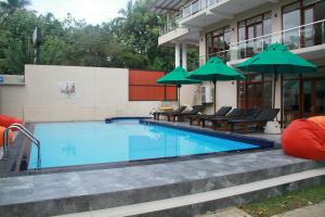 Bazén v ubytování Sanu Lagoon Resort & Spa nebo v jeho okolí