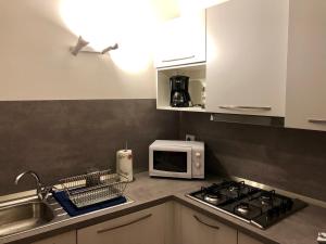 A kitchen or kitchenette at Gioel Studio