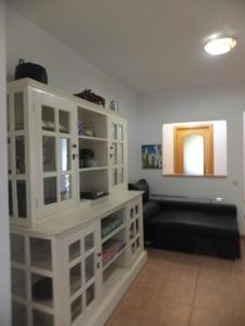 A bed or beds in a room at Puerta del Arco