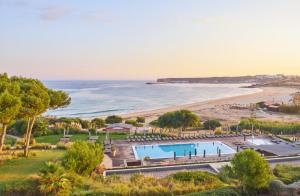 an aerial view of a resort with a beach at Martinhal Sagres Beach Family Resort Hotel in Sagres