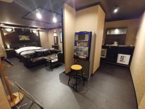 Voodi või voodid majutusasutuse Hotel Allure (Adult Only) toas