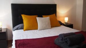 Llit o llits en una habitació de Barcelona Apartments Rental