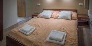 Ένα ή περισσότερα κρεβάτια σε δωμάτιο στο Pension Palla