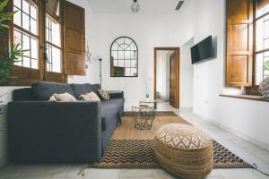 A seating area at LUXURY & NEW APARTMENT CORREDERA