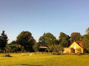 a house in the middle of a field at Landhausidylle in Naturparknähe in Rum Kogel