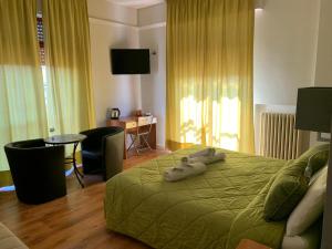 TV a/nebo společenská místnost v ubytování Sant'Oronzo B&B