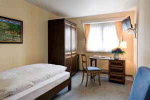 
Ein Bett oder Betten in einem Zimmer der Unterkunft Hotel Linde
