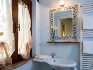Koupelna v ubytování Al Guado di Assisi B&B + 27 fotografií