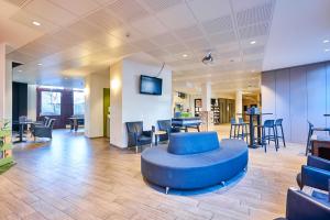 TV a/nebo společenská místnost v ubytování HI Brussels Generation Europe Hostel