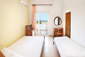 Postel nebo postele na pokoji v ubytování Hotel Stefani