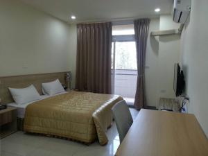 Postel nebo postele na pokoji v ubytování Best Warm B&B