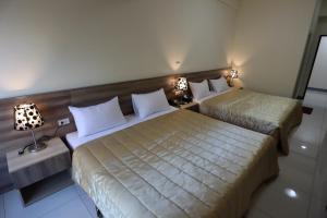Postel nebo postele na pokoji v ubytování Best Warm B&B