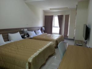 Postel nebo postele na pokoji v ubytování Best Warm B&B