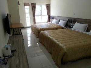Postel nebo postele na pokoji v ubytování Best Warm B&B