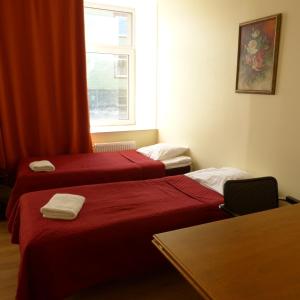 Katil atau katil-katil dalam bilik di Viva Nord Hotel