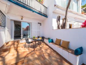 Balkón nebo terasa v ubytování SEAFRONT WITH TERRACE + 5 fotografií