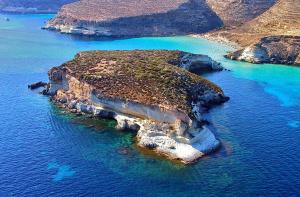 an island in the middle of the ocean at Appartamento Il Corallo Blu in Lampedusa