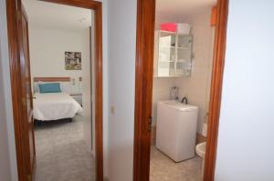 Ein Bett oder Betten in einem Zimmer der Unterkunft Armonía Beach 15