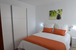 Ein Bett oder Betten in einem Zimmer der Unterkunft Armonía Beach 15