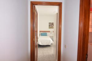 Ein Bett oder Betten in einem Zimmer der Unterkunft Armonía Beach 15
