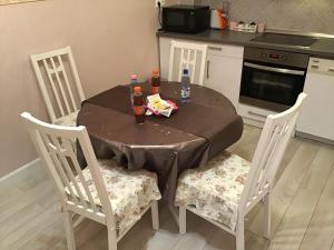 A kitchen or kitchenette at Family Wellness Apartman