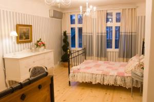 מיטה או מיטות בחדר ב-Villa Tammsaare