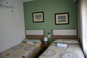 Кровать или кровати в номере Valencia Centro WiFi