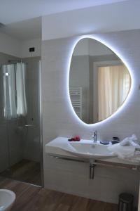 Baðherbergi á ALPieve Albergo Pieve