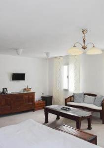 Телевизор и/или развлекательный центр в Resort U Fořta