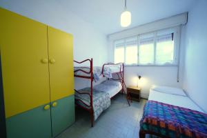 Postel nebo postele na pokoji v ubytování Villetta 2D + 37 fotografií