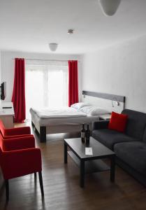 Кровать или кровати в номере Resort U Fořta