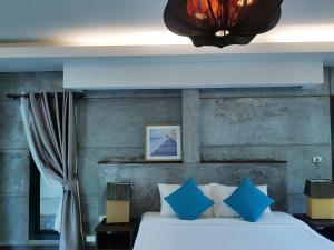 Voodi või voodid majutusasutuse In Touch Resort toas