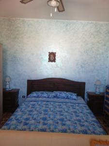LT SICILIA BELLA ROOMS房間的床