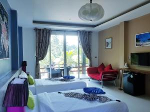 Voodi või voodid majutusasutuse In Touch Resort toas
