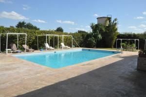 The swimming pool at or close to Gite Nadia