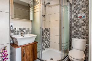 Koupelna v ubytování Elimia Suites & Studios