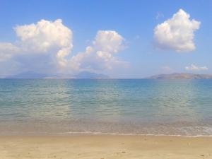 a view of the ocean from the beach at Anthia Apartments in Marmari