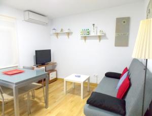 TV a/nebo společenská místnost v ubytování Apartamentos Capuchinas