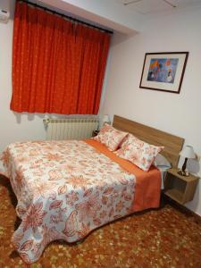 Posteľ alebo postele v izbe v ubytovaní Hostal Alvaro I