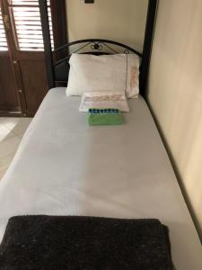 Uma cama ou camas num quarto em TanjaLucia Hostel