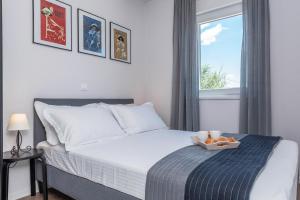 Posteľ alebo postele v izbe v ubytovaní Villa BLACK&BEAUTY