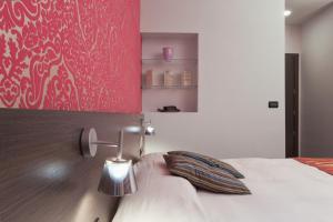 Posteľ alebo postele v izbe v ubytovaní MA Hotel