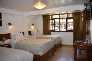 Postel nebo postele na pokoji v ubytování Casa De Luz Hotel