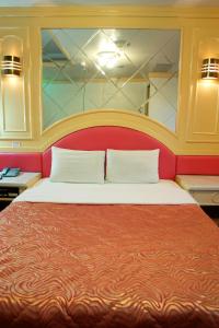 Letto o letti in una camera di Rido Hotel
