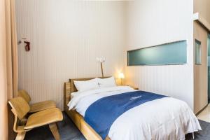 Postel nebo postele na pokoji v ubytování Incheon Aiport Airrelax hotel