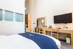 Postel nebo postele na pokoji v ubytování Incheon Aiport Airrelax hotel