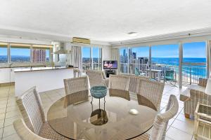 a living room with a view of the ocean at Talisman Apartments in Gold Coast