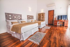 Postel nebo postele na pokoji v ubytování Kandy Casa by Regus
